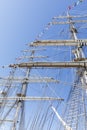 Tall masts of sailing ships with small flags Royalty Free Stock Photo