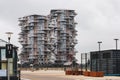 Tall modern residential building against a gray sky. Cactus tower in Copenhagen city. Royalty Free Stock Photo