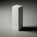 A tall narrow white rectangular prism casting a distinct shadow on a textured surface isolated on white background Royalty Free Stock Photo