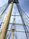 Tall Nautical Ship Mast with Cloudy Blue Sky Royalty Free Stock Photo
