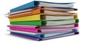 Stack of Brightly Colored Office Ring Binders with Documents on a White Background Royalty Free Stock Photo