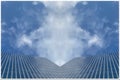 Tall office building in blue sky background with rising clouds Royalty Free Stock Photo