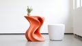 Bold Color Choices: A Sculptural Orange Stool With Flowing Forms