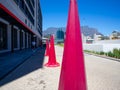 Tall and pink construction cones standing in the Silo District of Cape Town.