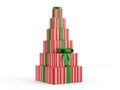 A tall pyramid shaped stack of red and white striped christmas gift boxes with green ribbons Royalty Free Stock Photo