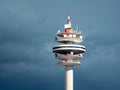 Tall Radio Tower in a cloudy dark sky in Vienna, Austria