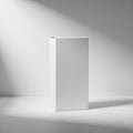 Tall rectangular white box set against a minimalist gray background. The box\'s Royalty Free Stock Photo