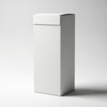 A tall, rectangular, white cardboard box standing upright against a plain background Royalty Free Stock Photo