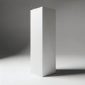A tall, rectangular, white object with a slightly textured surface stands against a gradient background Royalty Free Stock Photo