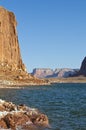 The tall red rock canyon lake cliff Royalty Free Stock Photo