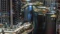 Tall residential buildings at JLT aerial night timelapse, part of the Dubai multi commodities centre mixed-use district. Royalty Free Stock Photo