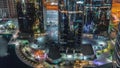 Tall residential buildings at JLT aerial night timelapse, part of the Dubai multi commodities centre mixed-use district. Royalty Free Stock Photo