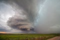 The tall, rotating updraft of a supercell thunderstorm towers over the plains in eastern Wyoming. Royalty Free Stock Photo