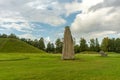 Tall rune stone at a burial ground in Sweden Royalty Free Stock Photo