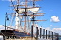 Tall ship at dock in summer