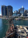 Tall ship docked at city wharf