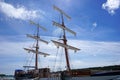 Tall ship mast with rolled sails Royalty Free Stock Photo