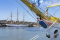 The tall ship Mircea with its beautiful figurehead with in the background the ships Cisne Branco and Europa