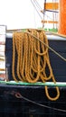 Tall ship mooring rope looped over railing