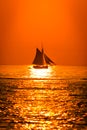 Tall ship sailing at sunset on Lake Michigan Royalty Free Stock Photo