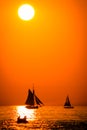 Tall ship sailing at sunset on a summer night on Lake Michigan in South Haven Michigan Royalty Free Stock Photo