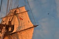 Tall ship sails   airplane and blue sky Royalty Free Stock Photo