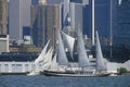 Tall ships sail in a parade in New York Harbor during the 100 year celebration for the Statue of Liberty, July 3, 1986 Royalty Free Stock Photo