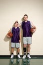 Tall and short basketball players Royalty Free Stock Photo