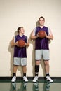 Tall and short basketball players Royalty Free Stock Photo