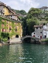 A Tall shot of a beautiful bridge on Lake Como Italy