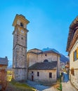 The clocktower and apse of Santa Maria Lauretana Church, Sonogno, Valle Verzasca, Switzerland Royalty Free Stock Photo