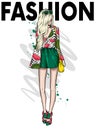 A tall slender girl in short shorts, and t-shirt. Beautiful model in stylish clothes. Vector illustration.