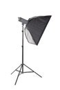 A tall softbox isolated on a white background. Professional photographic equipment. A softbox with a flashlight. Lighting tools. Royalty Free Stock Photo