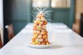 tall, spiraling croquembouche with spun sugar webbing