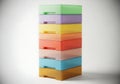 Stack of colorful plastic storage boxes isolated on white background Royalty Free Stock Photo