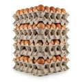 Tall stack of brown eggs in cardboard cartons Royalty Free Stock Photo