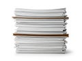 Tall stack of organized paper documents with clips isolated on white background Royalty Free Stock Photo