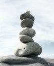 Tall stack pile of balanced stones rocks against sky Royalty Free Stock Photo