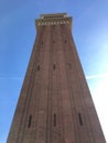 Tall tower made of brick in Barcelona.