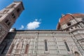 Tall towers on white structure of the 14th century Cattedrale di Santa Maria del Fiore, historical Florence of Italy Royalty Free Stock Photo