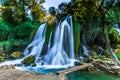 July 12, 2016: A tall waterfall at the Kravica Waterfalls, Bosnia and Herzegovina