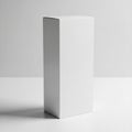 Tall White Rectangular Box or Package on White Surface with Shadow container packaging Royalty Free Stock Photo
