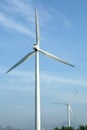 Tall windmill with lake, mountan view from rural India