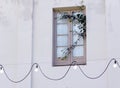 tall window of old european quarter. picturesque facade