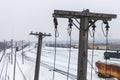 Tall wooden telephone poles along the train tracks in Winnipeg, Manitoba, Canada