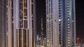 Tallest skyscrapers in downtown dubai located on bouleward street near shopping mall aerial all night timelapse. Royalty Free Stock Photo