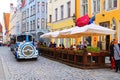 Blue City Train, tourist sightseeing vehicle, is driven through Pikk Steet in the Old Town of Tallinn, UNESCO World Heritage site
