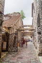 TALLINN, ESTONIA - AUGUST 22, 2016: People walk on a cobbled street in the old town in Tallin