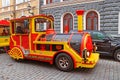Red City Train, tourist sightseeing vehicle, is driven through Lai Steet in the Old Town of Tallinn, UNESCO World Heritage site