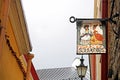 View of old buildings and signboard of Souvenirs shop on Verine Street, Tallinn, Estonia